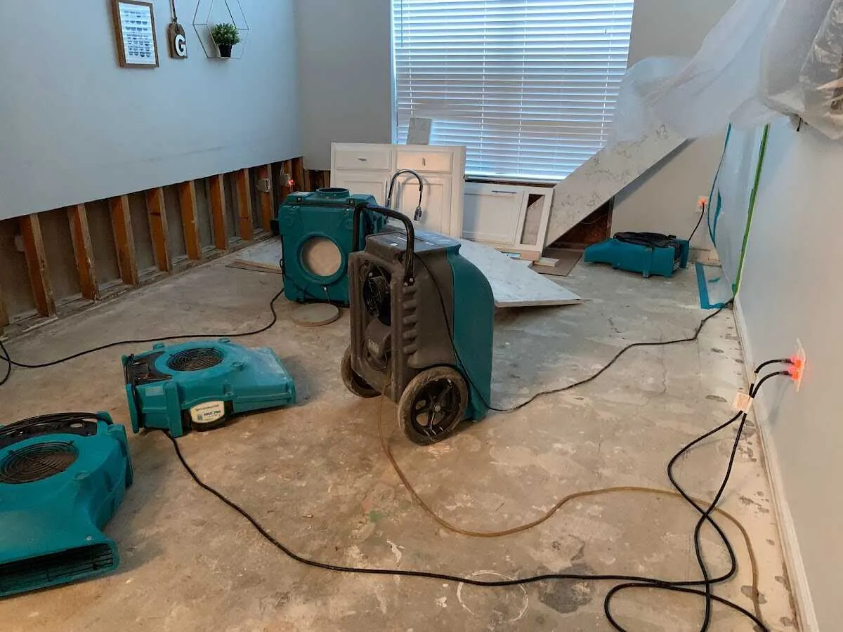 Dehumidifier in flood-cut room for Water Damage Restoration in Round Lake